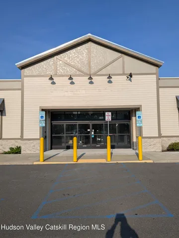 a view of a pathway both side of house