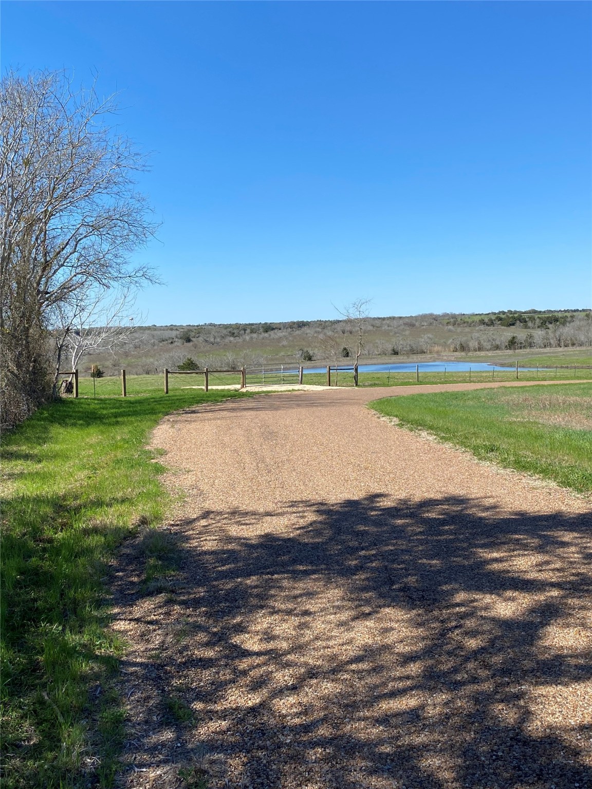 5914 Guettermann Ehler Road Muldoon, TX 78949 - Photo 2 of 11 a view of a lake with a beach