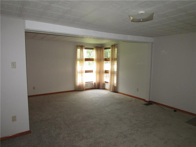4697 Williamsport Road Monongahela, PA 15063 - Photo 11 of 23 Living Room. New wall to wall carpet throughout home