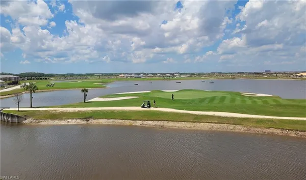a view of a lake with a city
