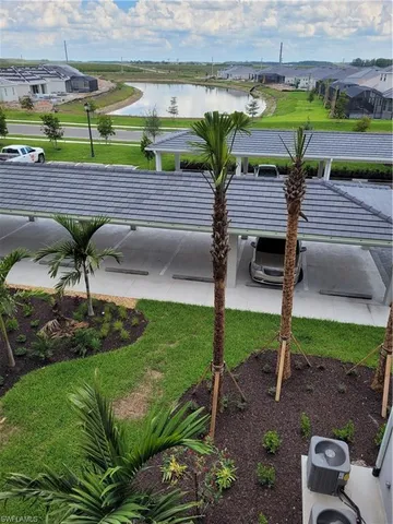 a view of an outdoor sitting space area with furniture