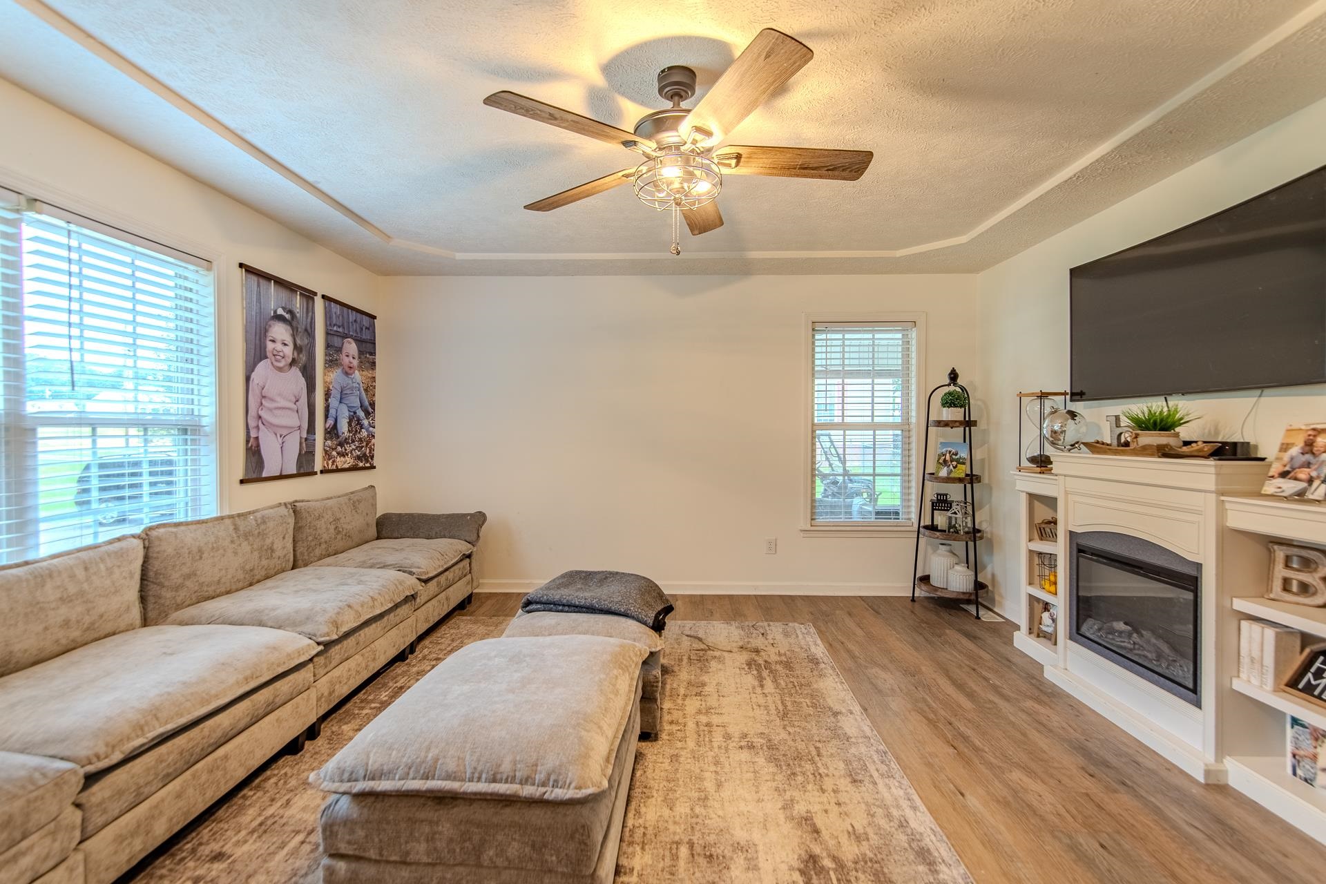 80 Tom Way Savannah, TN 38372 - Photo 12 of 33 a living room with furniture and a fireplace