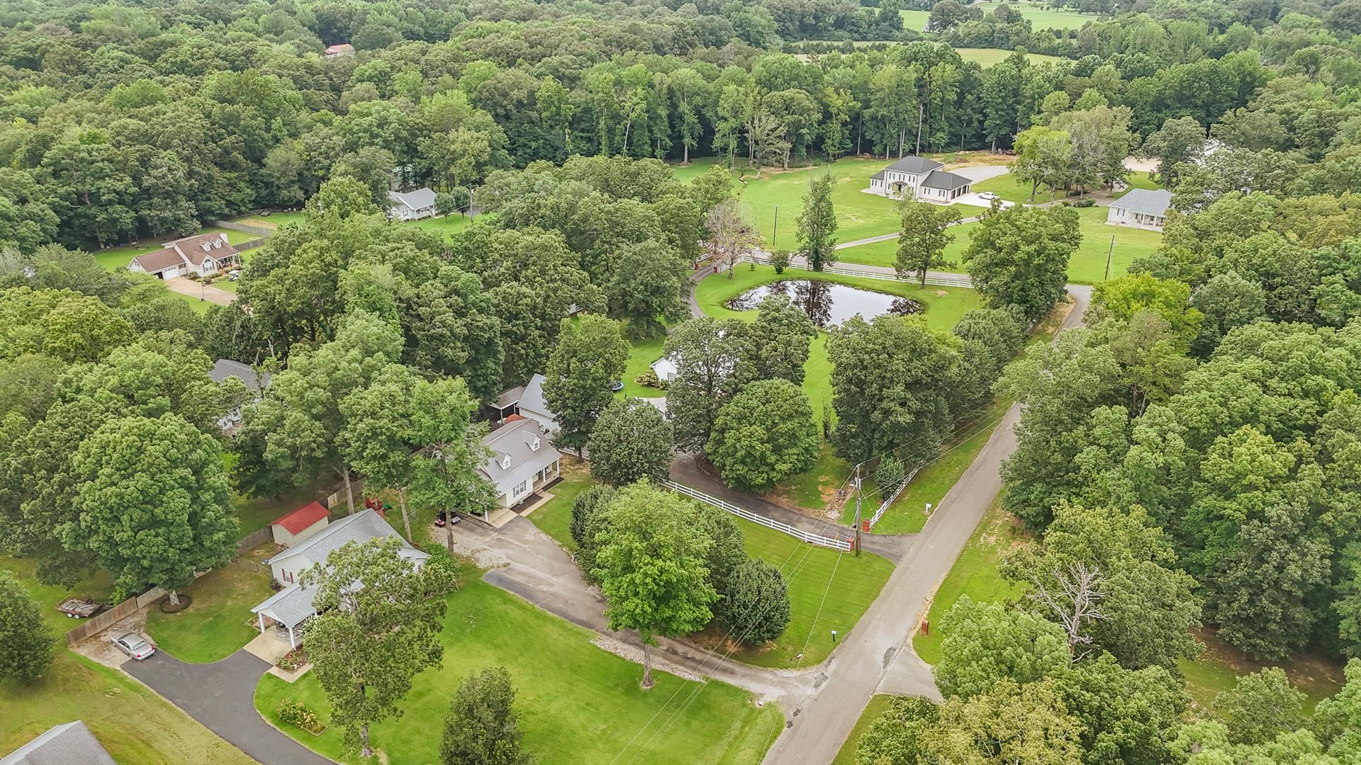 80 Tom Way Savannah, TN 38372 - Photo 20 of 33 an aerial view of residential houses with outdoor space and trees