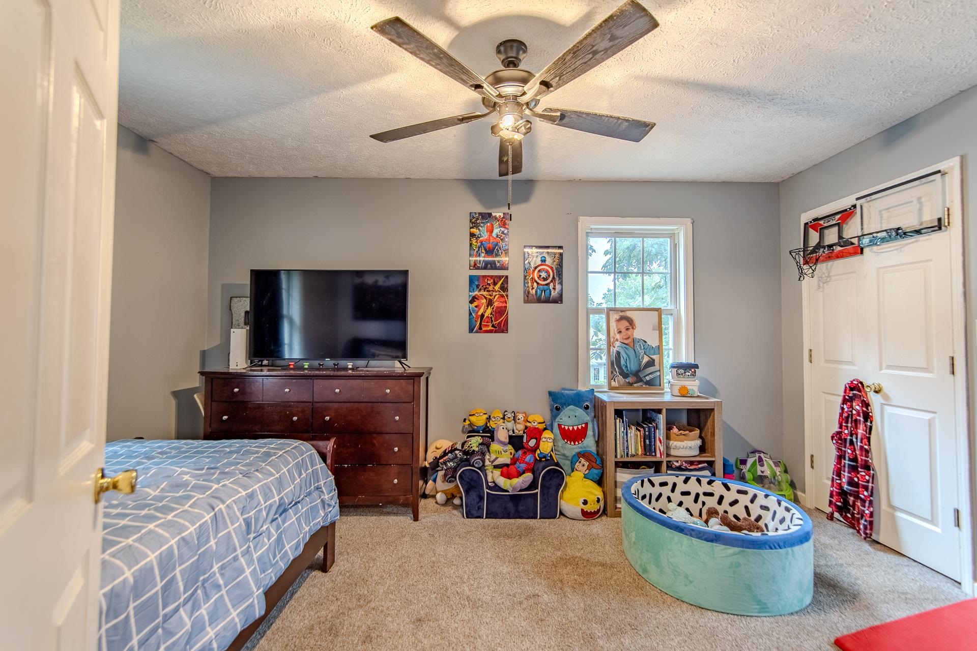 80 Tom Way Savannah, TN 38372 - Photo 30 of 33 a bedroom with furniture and a flat screen tv