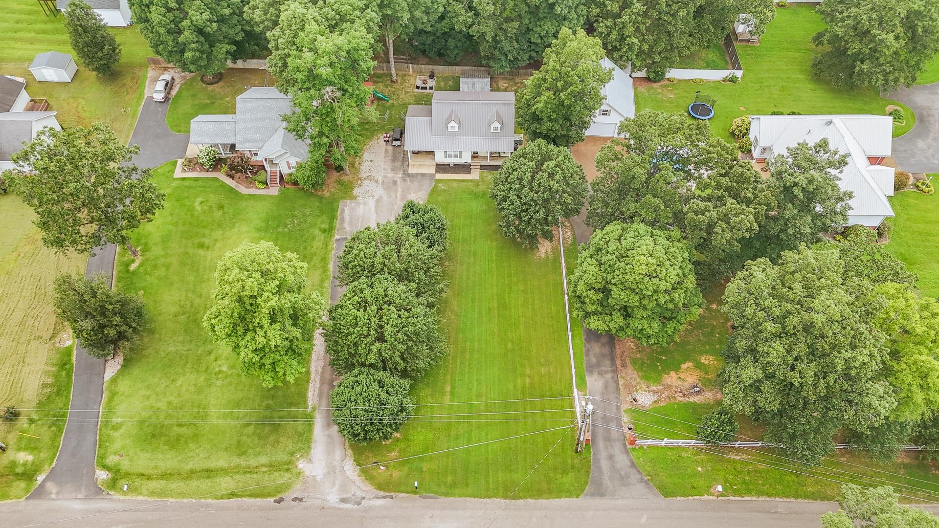 80 Tom Way Savannah, TN 38372 - Photo 3 of 33 an aerial view of a residential houses with outdoor space