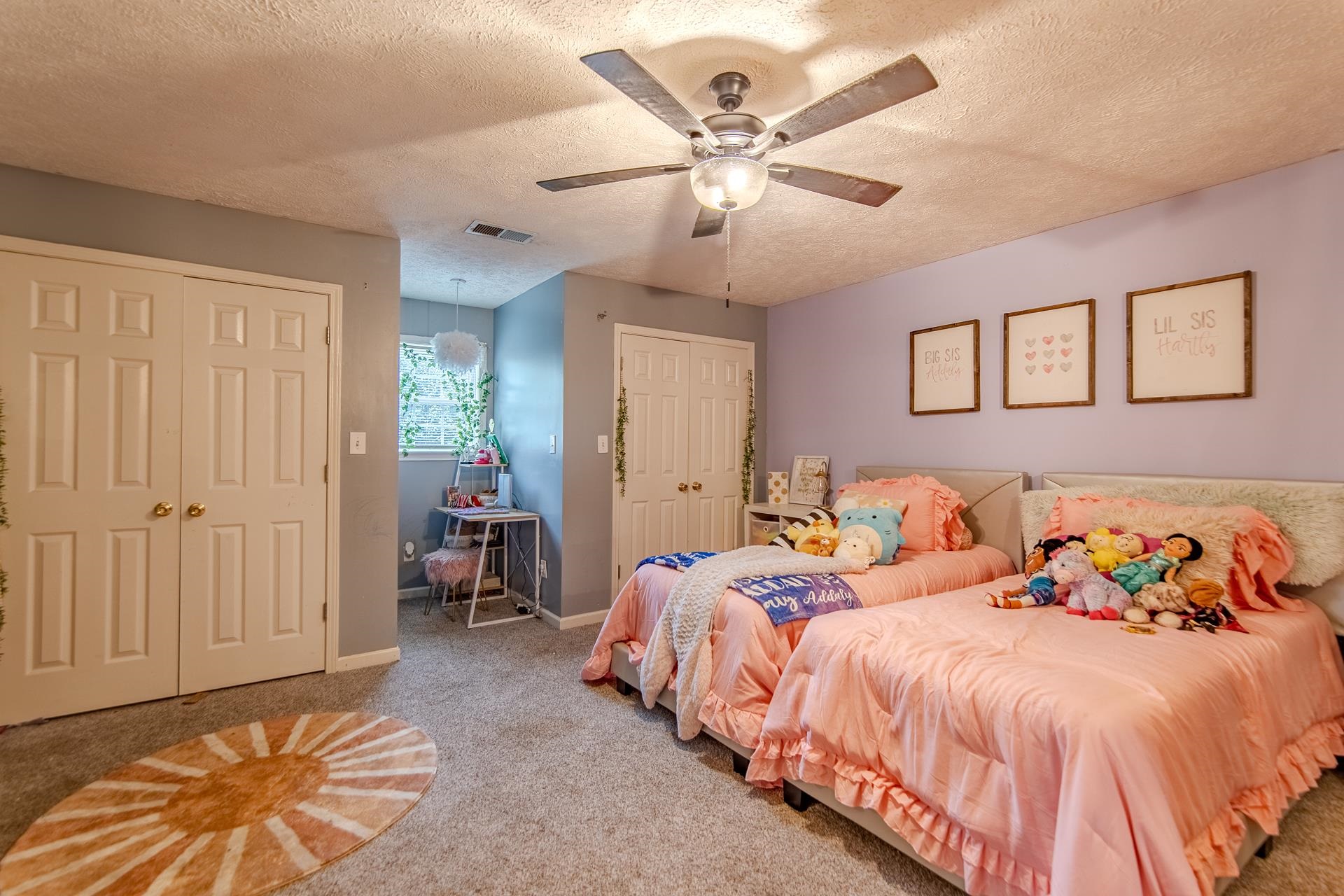 80 Tom Way Savannah, TN 38372 - Photo 33 of 33 a bedroom with a bed and a chandelier