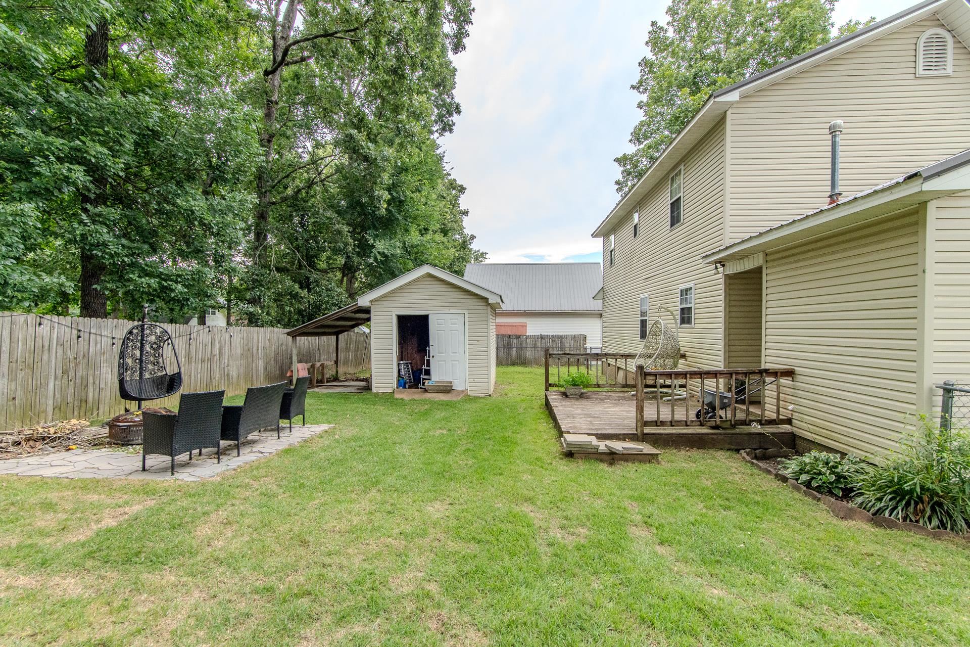 80 Tom Way Savannah, TN 38372 - Photo 5 of 33 a view of a house with backyard and sitting area