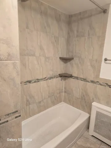 a bathroom with a bathtub