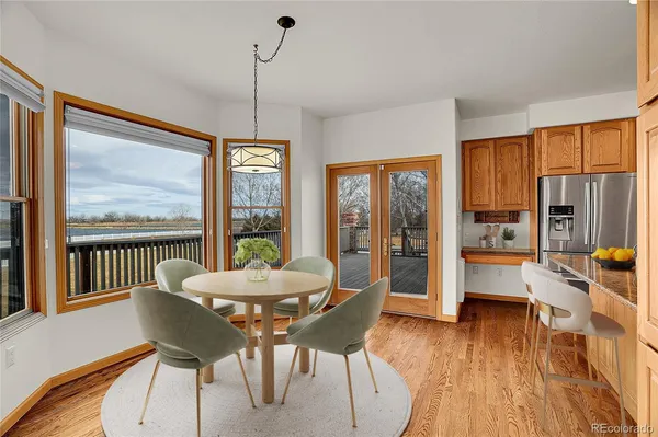 a dining room with furniture window wooden floor