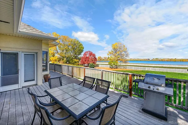 a view of a chairs and table on the wooden floor