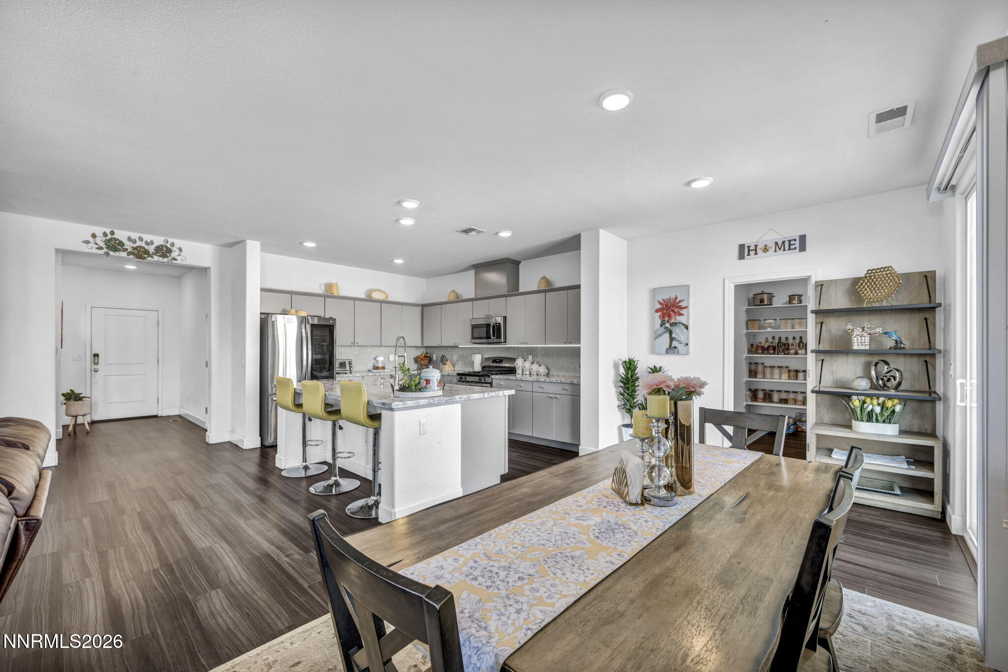 969 Estuary Circle Reno, NV 89506 - Photo 15 of 59 a view of a dining room kitchen and a wooden floor
