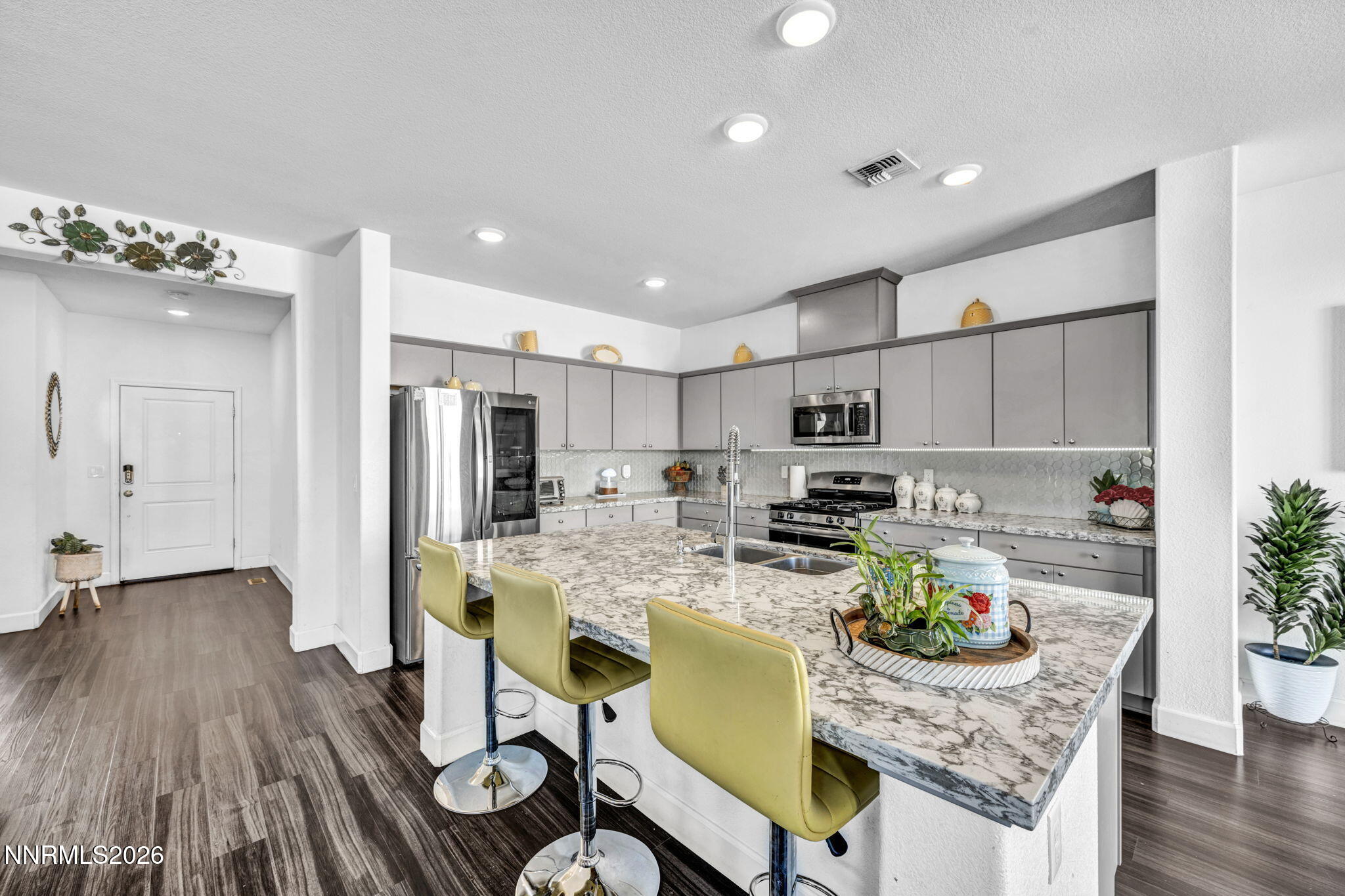 969 Estuary Circle Reno, NV 89506 - Photo 19 of 59 a kitchen with refrigerator and cabinets