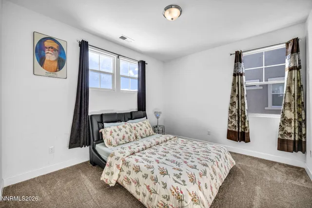 a open kitchen with stainless steel appliances granite countertop a stove and a wooden floors