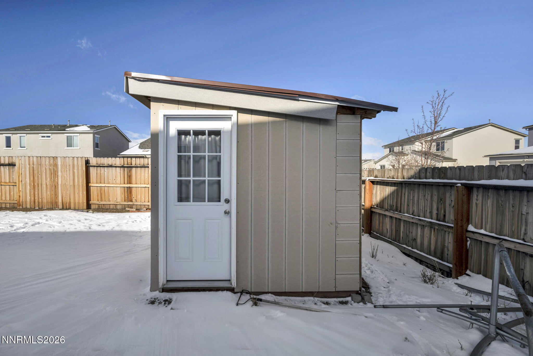 969 Estuary Circle Reno, NV 89506 - Photo 45 of 59 a view of a house with a wooden deck