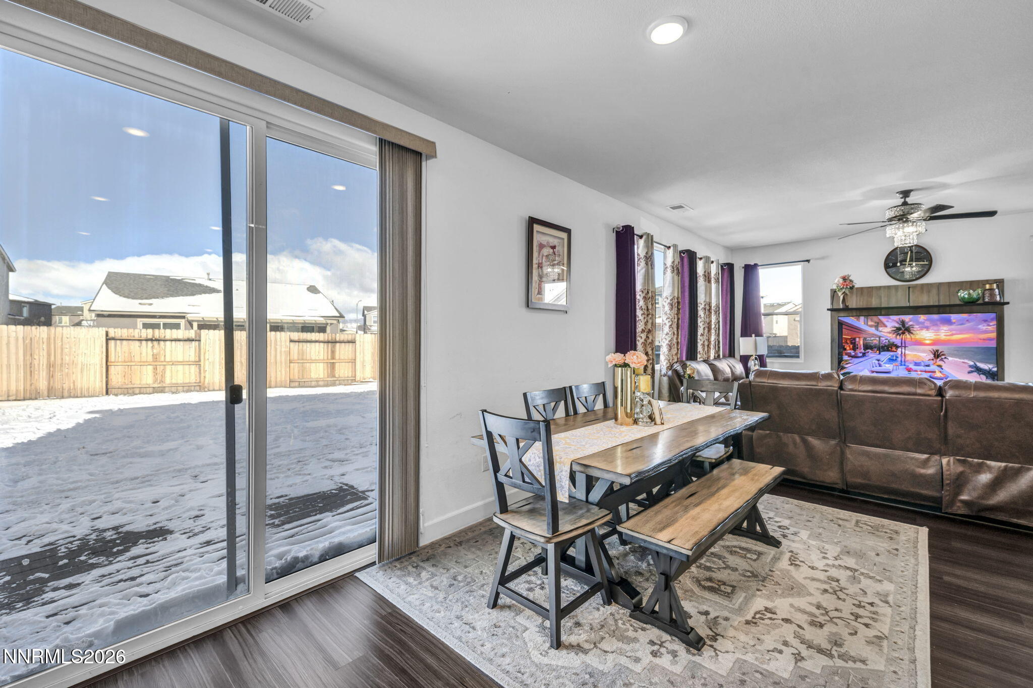 969 Estuary Circle Reno, NV 89506 - Photo 8 of 59 a living room with furniture and a floor to ceiling window