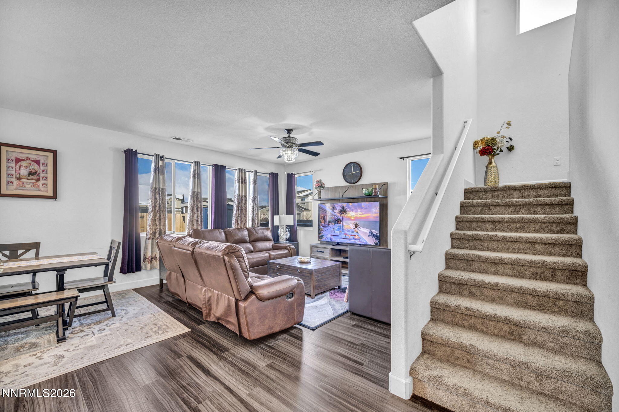 969 Estuary Circle Reno, NV 89506 - Photo 9 of 59 a living room with furniture and a painting