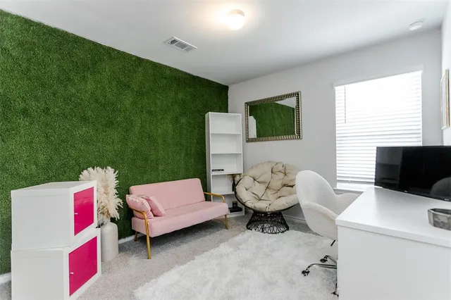 a kitchen with a sink and a refrigerator