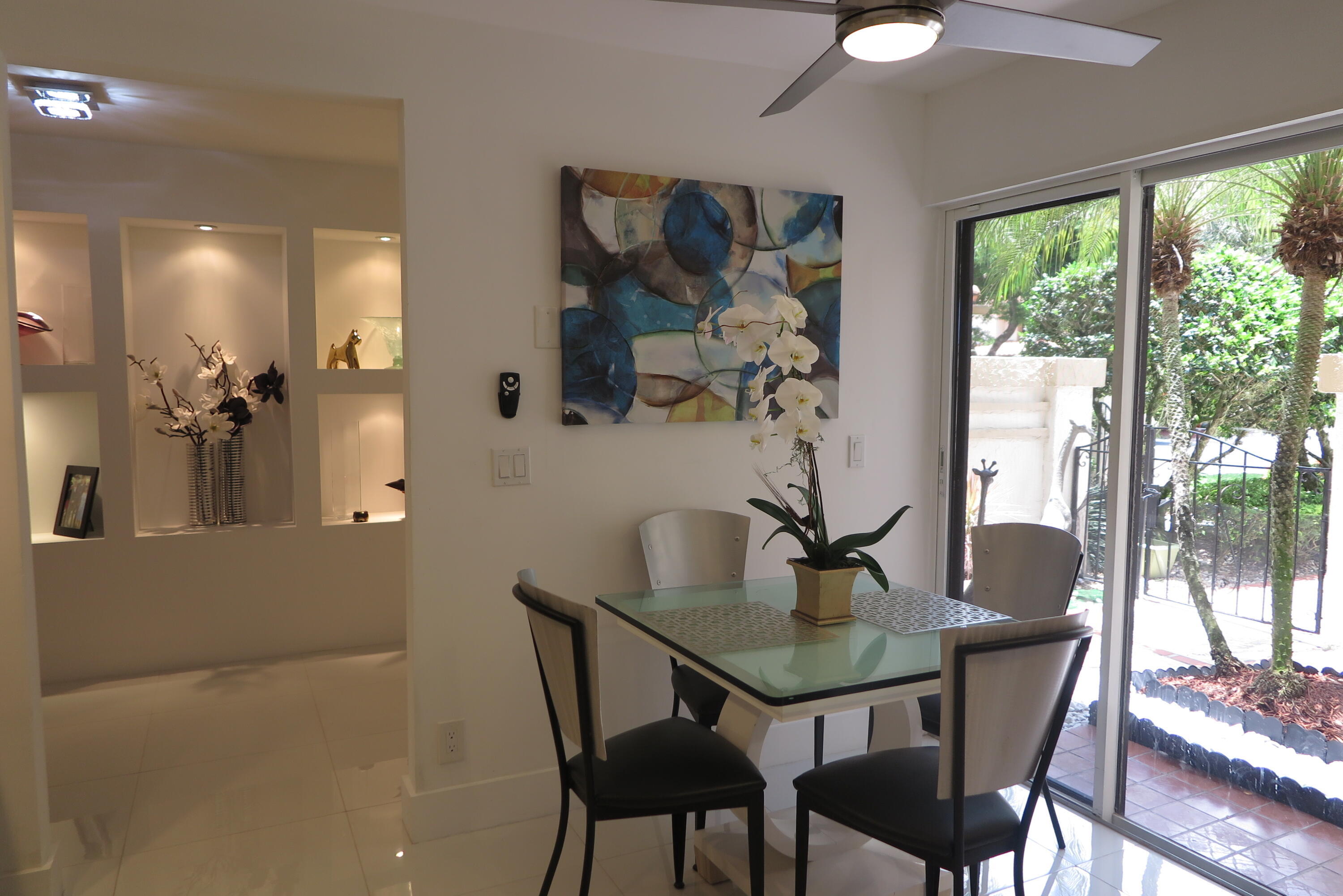 7875 La Mirada Drive Boca Raton, FL 33433 - Photo 14 of 31 a dining room with furniture and window