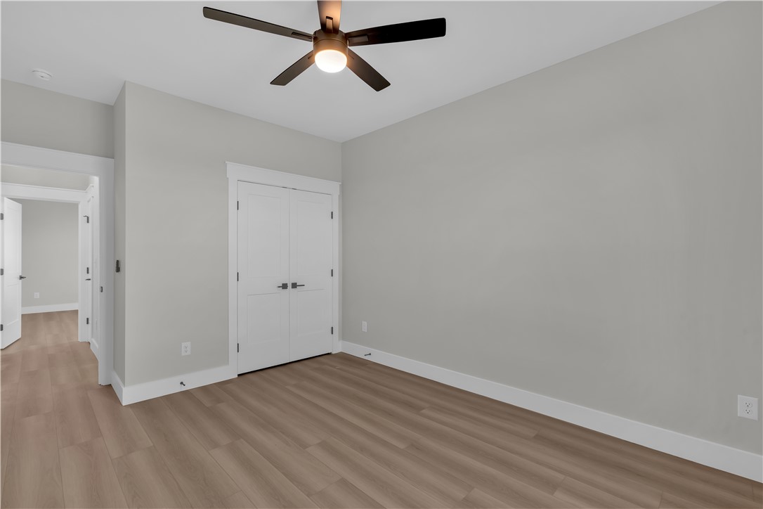 516 Lakeside Drive Anderson, SC 29621 - Photo 11 of 32 Well-lit room featuring durable flooring and a stylish ceiling fan.
