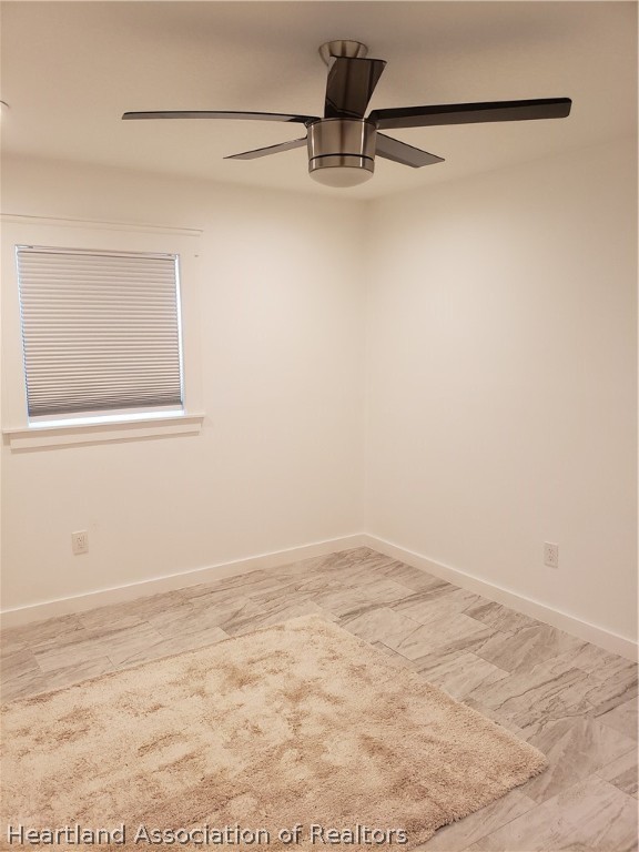 2247 West Longbottom Road Avon Park, FL 33825 - Photo 11 of 21 a view of a small space with wooden floor and a window