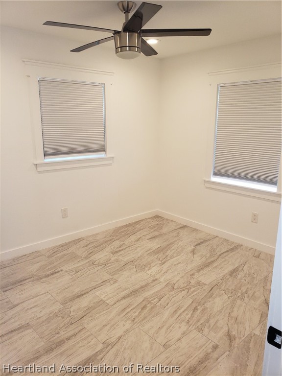 2247 West Longbottom Road Avon Park, FL 33825 - Photo 13 of 21 a view of a room that has a window and wooden floor