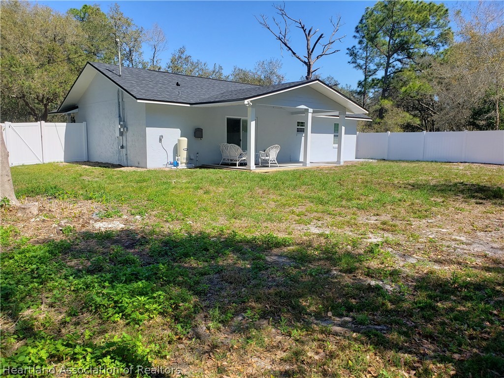 2247 West Longbottom Road Avon Park, FL 33825 - Photo 19 of 21 a front view of house with yard and green space