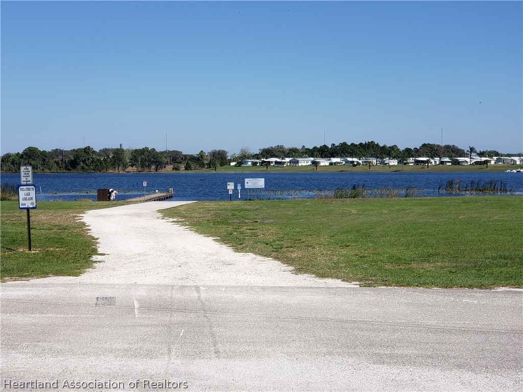 2247 West Longbottom Road Avon Park, FL 33825 - Photo 21 of 21 a view of a swimming pool and lake view