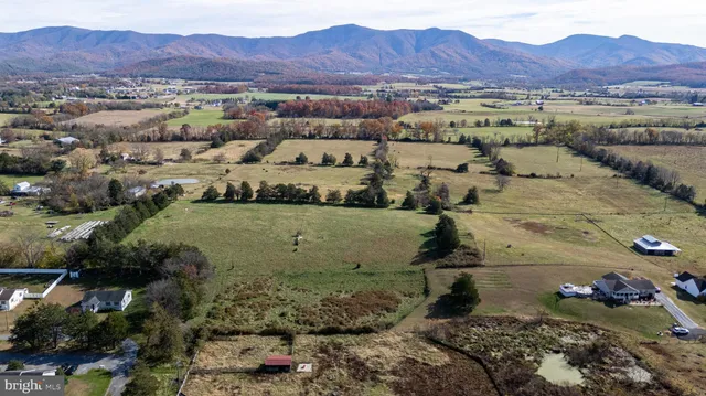 a view of a city with mountains in the background