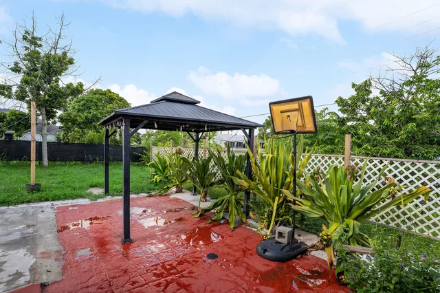 a backyard of a house with lots of green space