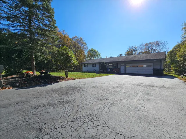 a view of swimming pool with trees in the background
