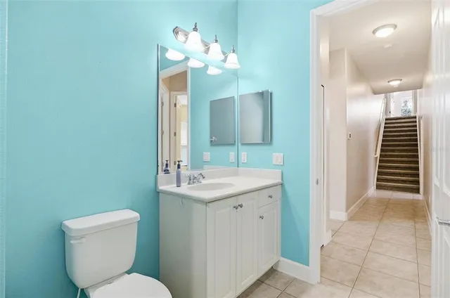 a view of a house with backyard sitting area and porch