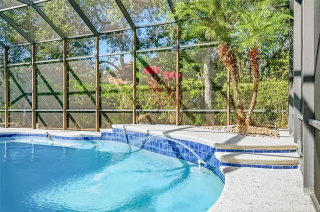 a kitchen with sink and cabinets