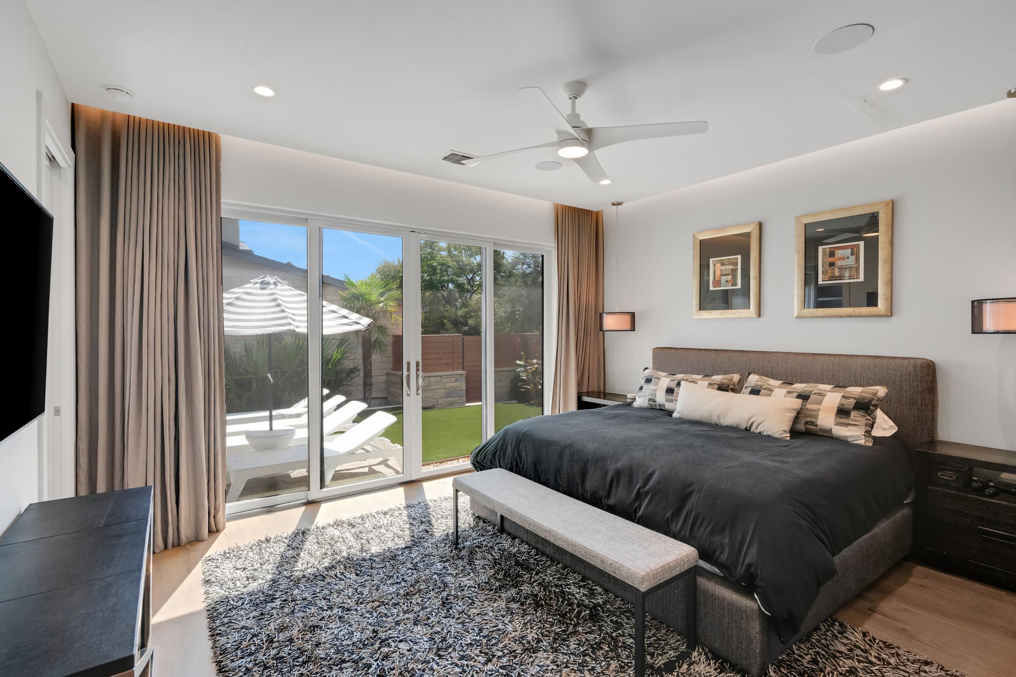 809 Bouldin Avenue Austin, TX 78704 - Photo 11 of 39 Bedroom with access to outside, ceiling fan, light wood-type flooring, and recessed lighting