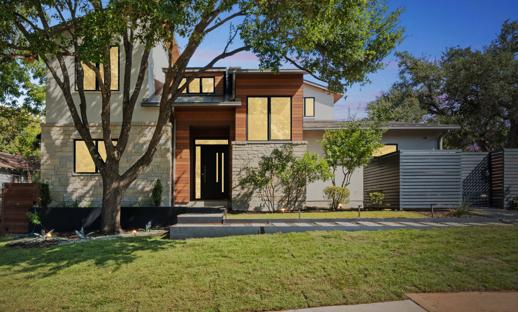809 Bouldin Avenue Austin, TX 78704 - Photo 5 of 39 a front view of a house with a yard