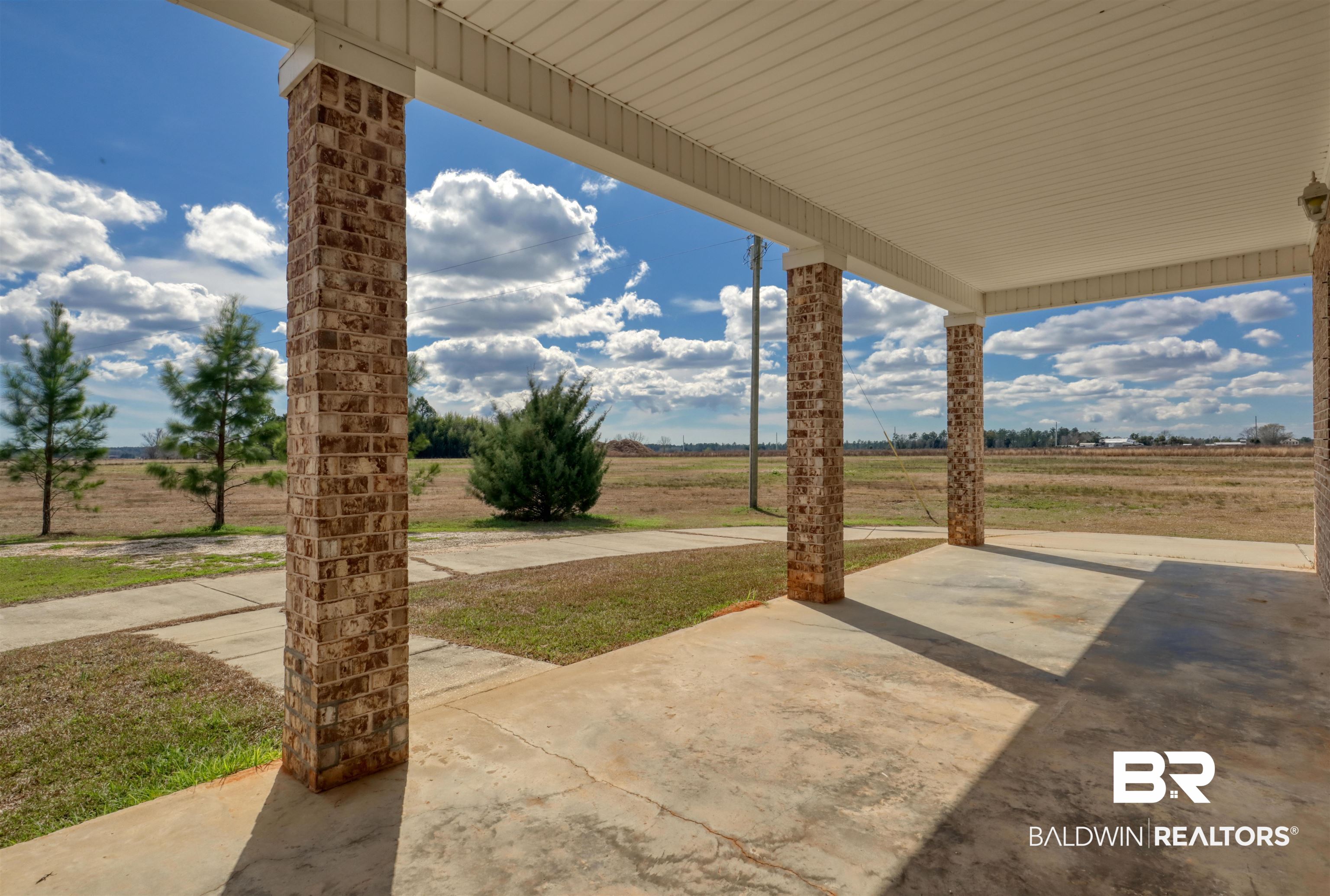 28461 Gardner Road Elberta, AL 36530 - Photo 29 of 46 View of patio / terrace featuring a rural view