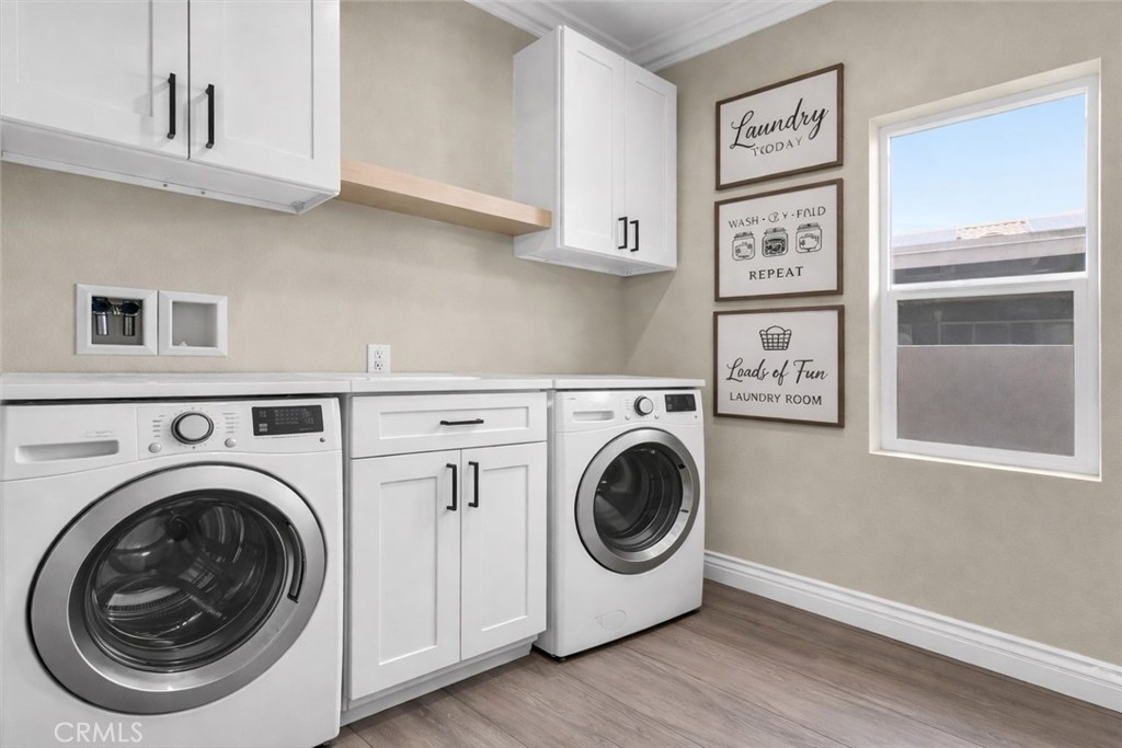 14388 Dove Canyon Drive Riverside, CA 92503 - Photo 11 of 38 a utility room with dryer and washer