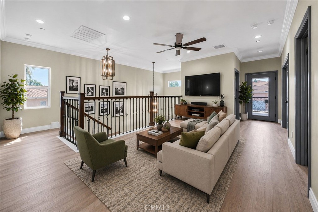 14388 Dove Canyon Drive Riverside, CA 92503 - Photo 14 of 38 a living room with furniture and a flat screen tv