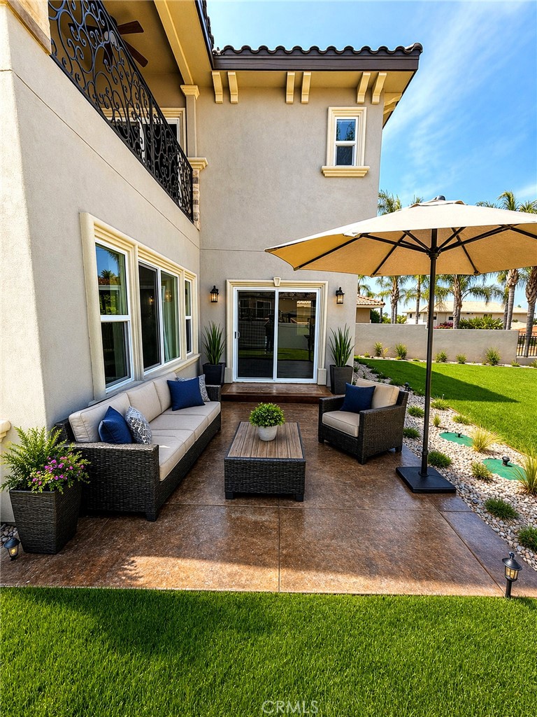 14388 Dove Canyon Drive Riverside, CA 92503 - Photo 32 of 38 a building outdoor space with patio furniture and potted plants
