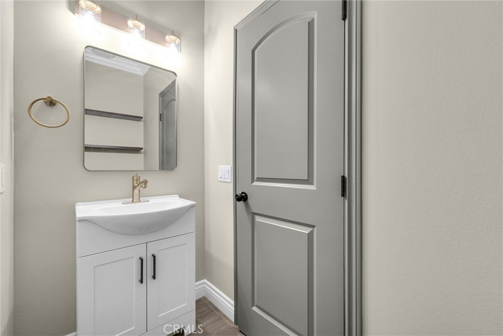 14388 Dove Canyon Drive Riverside, CA 92503 - Photo 10 of 38 a bathroom with a sink and a mirror
