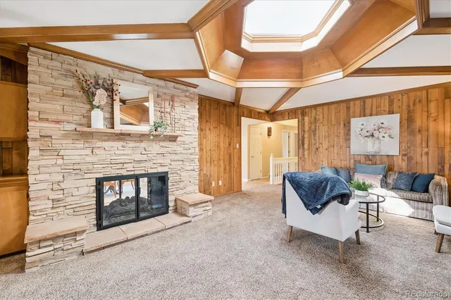 a open kitchen with window and chandelier