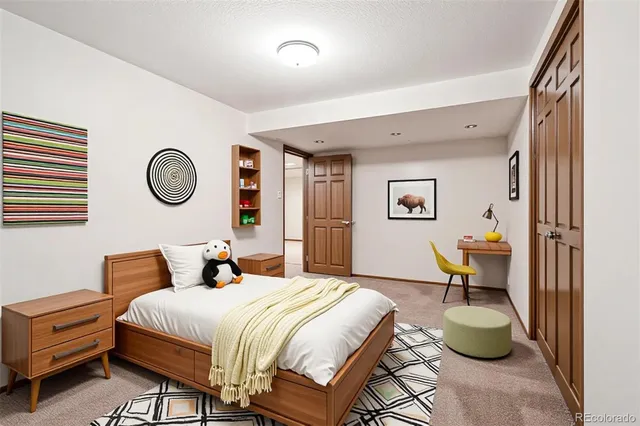 a bathroom with a sink a toilet a mirror and shower