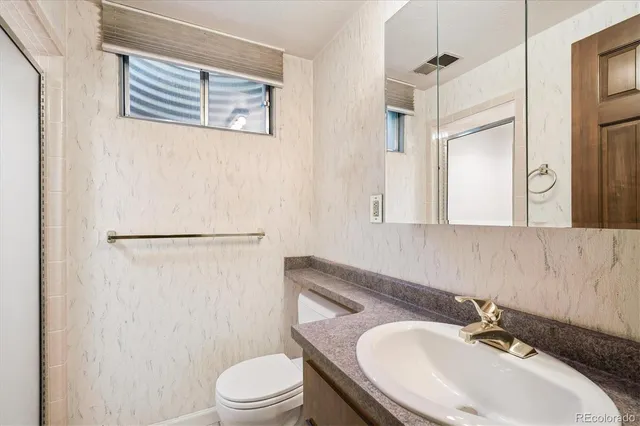 a workspace with furniture and window