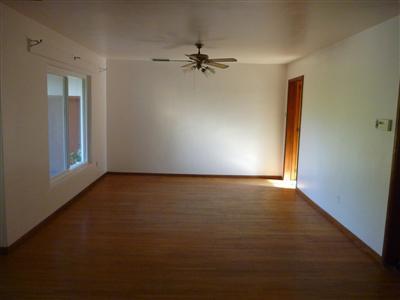 528 South Rice Road Ojai, CA 93023 - Photo 3 of 15 an empty room with a ceiling fan and window