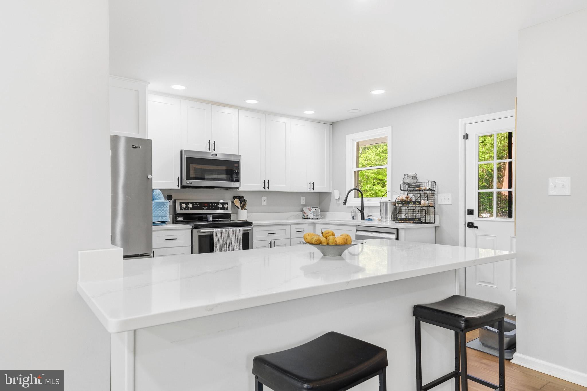 11450 Little Cove Point Road Lusby, MD 20657 - Photo 14 of 68 Kitchen with spacious countertops