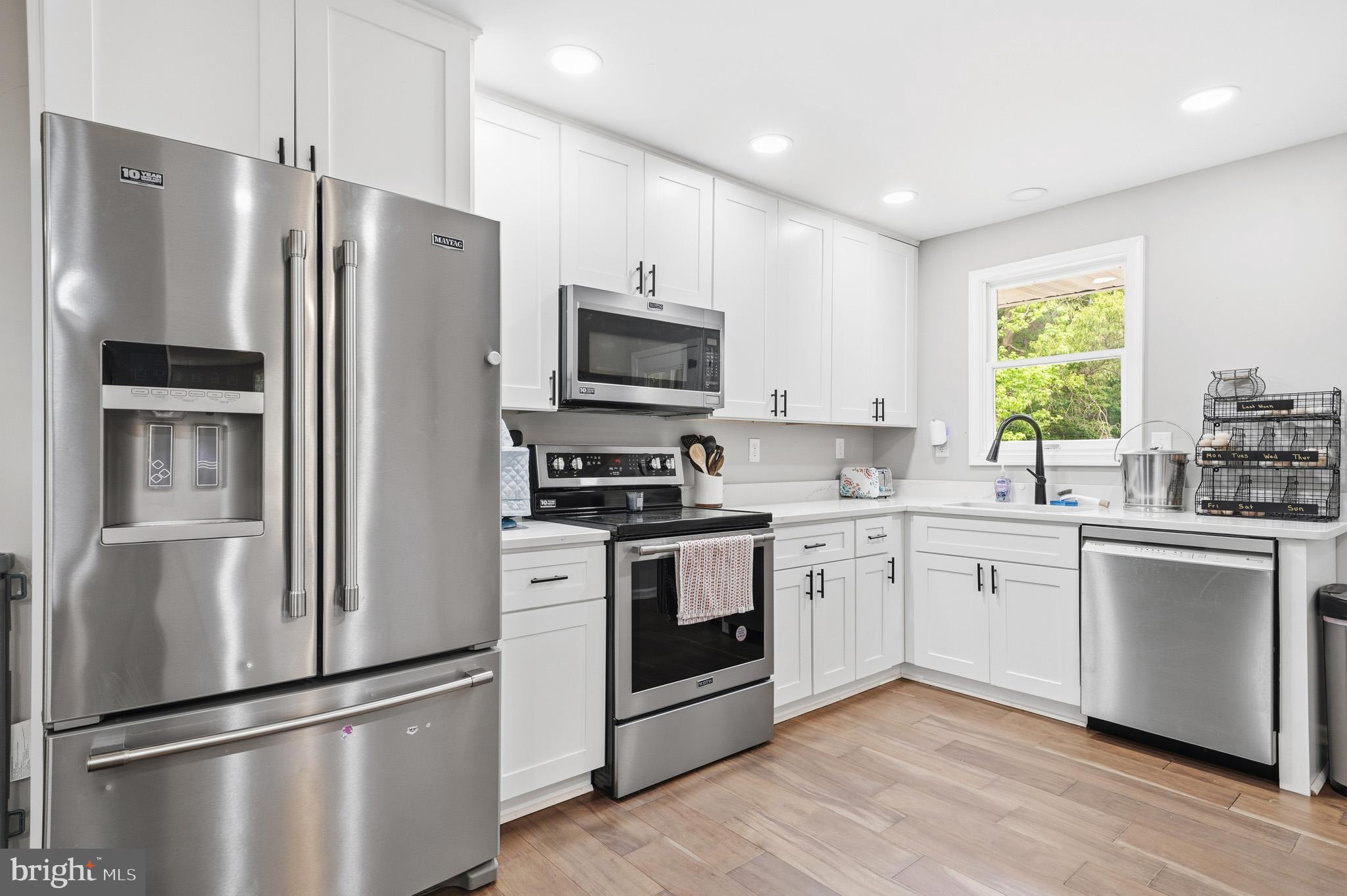 11450 Little Cove Point Road Lusby, MD 20657 - Photo 17 of 68 Kitchen with stainless steel appliances
