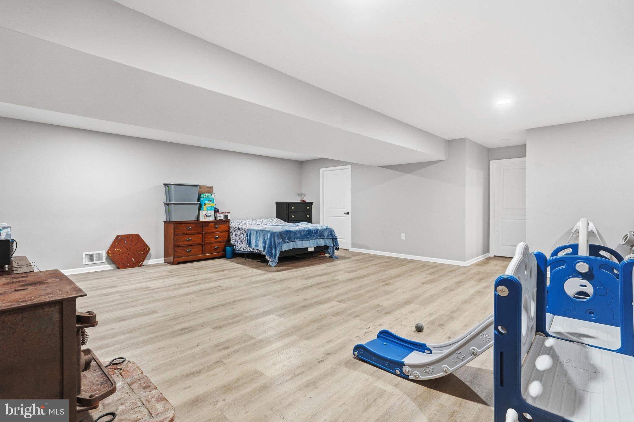 11450 Little Cove Point Road Lusby, MD 20657 - Photo 40 of 68 Basement open rec room
