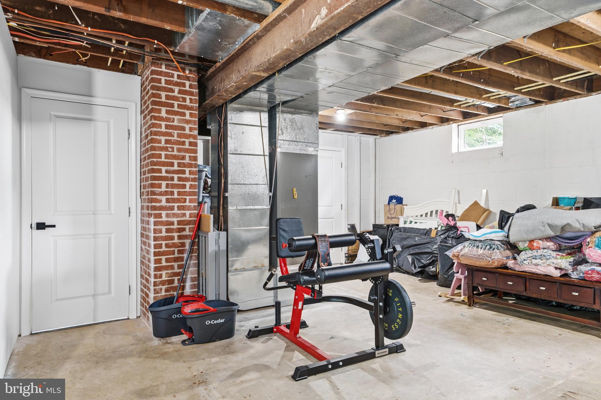 11450 Little Cove Point Road Lusby, MD 20657 - Photo 45 of 68 Basement with tons of storage space