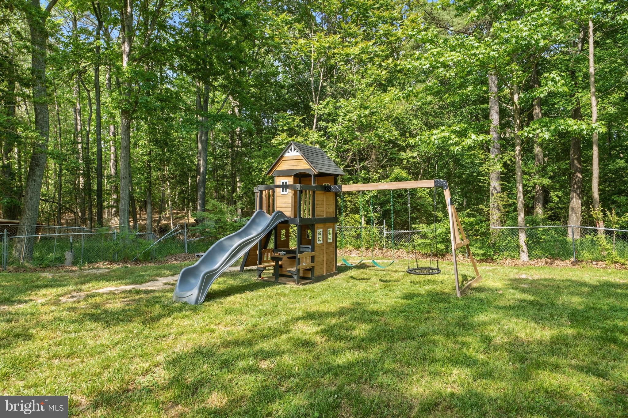 11450 Little Cove Point Road Lusby, MD 20657 - Photo 55 of 68 Backyard playset