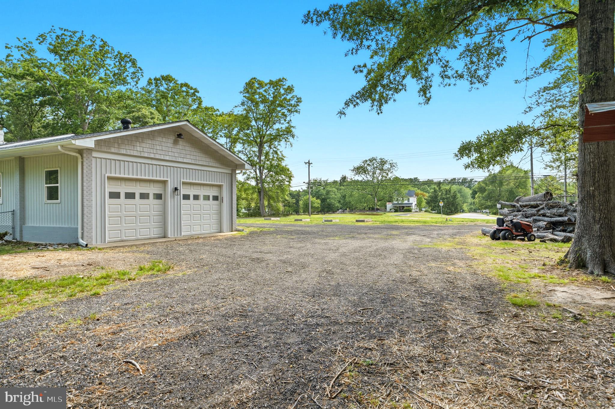 11450 Little Cove Point Road Lusby, MD 20657 - Photo 60 of 68 Driveway with 2-car garage