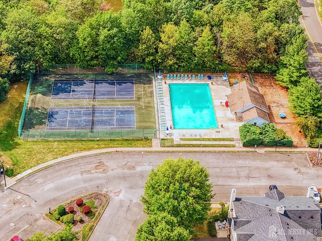 a view of a swimming pool with an outdoor space